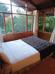 Fotografie z fotogalerie ubytování Mindo Wood Cabin v destinaci Mindo