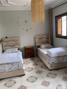 Ένα ή περισσότερα κρεβάτια σε δωμάτιο στο Amazigh privat house