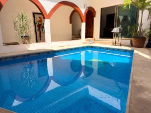 Πισίνα στο ή κοντά στο Suite Moni tranquila y elegante
