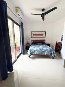 Ένα ή περισσότερα κρεβάτια σε δωμάτιο στο Suite Gaby con acceso a la playa