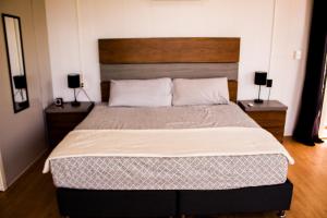 Ένα ή περισσότερα κρεβάτια σε δωμάτιο στο Casa Abitare Armonía