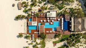 a rendering of a villa with a swimming pool at 3BR Beachfront Luxury Condo w/ Great Features in Cancún