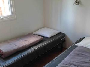 Ένα ή περισσότερα κρεβάτια σε δωμάτιο στο Mobil home 32m² avec terrasse pour 4 personnes à Anduze - API-1-52-404 +22 φωτογραφίες