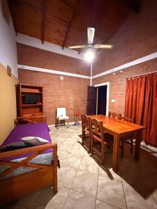 Ένα ή περισσότερα κρεβάτια σε δωμάτιο στο Santa Rosa Cabañas
