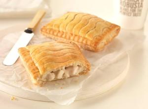 two pastries on a plate on a table at AJ Pizza and Steakhouse in Ban Khai Nun