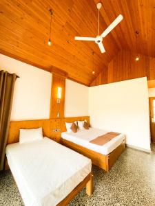 Postel nebo postele na pokoji v ubytování Ahas Pokuna Holiday Resort