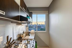 Kuchyň nebo kuchyňský kout v ubytování Top Ubicacion Vistas al Campo de Polo y Piscina!