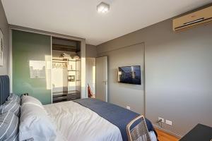 Postel nebo postele na pokoji v ubytování Top Ubicacion Vistas al Campo de Polo y Piscina! + 42 fotografií