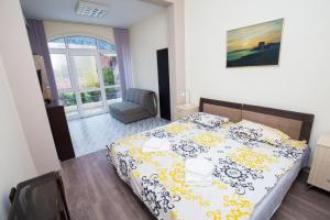 Postel nebo postele na pokoji v ubytování Art GuestHouse