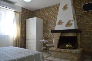 Postel nebo postele na pokoji v ubytování B&B A Casa di Lilla