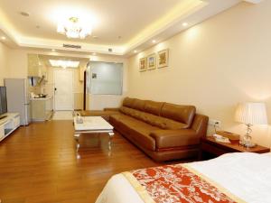 Area soggiorno di Guangzhou Pengman Apartment Zhengjia Huanshi Branch