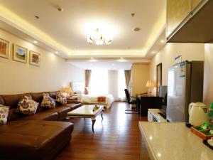 Area soggiorno di Guangzhou Pengman Apartment Zhengjia Huanshi Branch