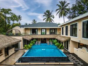 Πισίνα στο ή κοντά στο SaffronStays Frangipani