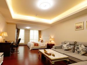 Area soggiorno di Guangzhou Pengman Apartment Zhengjia Huanshi Branch