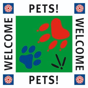 a sign for a pet store with the words pets at Customs Cottage in Teignmouth
