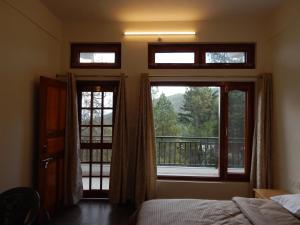 Ένα ή περισσότερα κρεβάτια σε δωμάτιο στο Matryoshka Homestay +14 φωτογραφίες