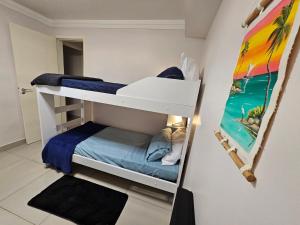 Postel nebo postele na pokoji v ubytování Cantinho Sol&Dan - 1 quarto em apto familiar