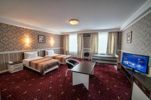 Hotel Orto Asia tesisinde lounge veya bar alanı