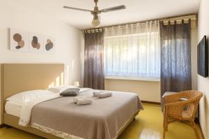 Ένα ή περισσότερα κρεβάτια σε δωμάτιο στο Apartament Sabbiadoro Center