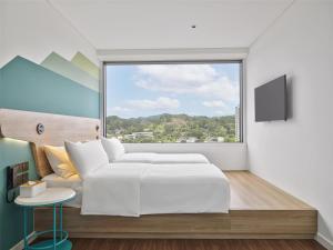 Tru by Hilton Lang Son City Centre客房内的一张或多张床位