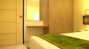 Eazy Suite Legian客房内的一张或多张床位