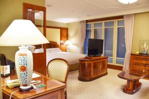 Televiisor ja/või meelelahutuskeskus majutusasutuses Evergreen Laurel Hotel Taipei