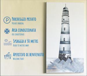 a book with a picture of a lighthouse at La maison à la mer in Gaeta