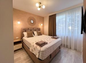 Ένα ή περισσότερα κρεβάτια σε δωμάτιο στο Old City Home For Your Memories