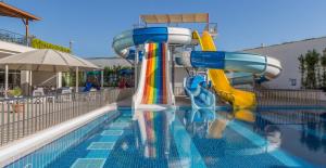 a water slide in the middle of a swimming pool at Mary Hotel Side in Side