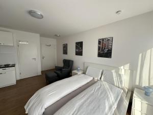 Postel nebo postele na pokoji v ubytování City Apartment mit Schlossblick