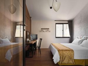 Vuode tai vuoteita majoituspaikassa 未艾公寓WeLove Apartment