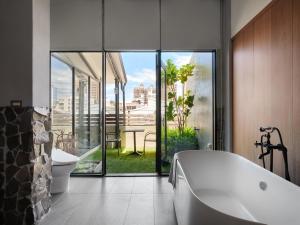 Kylpyhuone majoituspaikassa 未艾公寓WeLove Apartment
