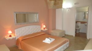Postel nebo postele na pokoji v ubytování Antico Casale B&B + 37 fotografií