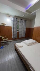 Fotografie z fotogalerie ubytování Nhà Nghỉ Hoa Đào v destinaci Thuan An