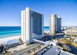 an aerial view of a city with the beach and buildings at Romantic Beachfront Sunsets in Panama City Beach