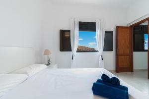 Ένα ή περισσότερα κρεβάτια σε δωμάτιο στο Home2Book Atlantic View Escape in Gáldar