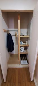 a small room with a staircase in a house at Inn Komachiya - Vacation STAY 90965v in Senboku