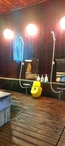 a bathroom with a yellow object on the floor at Inn Komachiya - Vacation STAY 90965v in Senboku