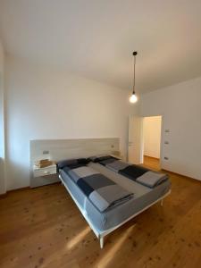 Ένα ή περισσότερα κρεβάτια σε δωμάτιο στο Balina apartment