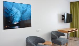 Uma televisão e/ou sistema de entretenimento em Hotel Selfoss