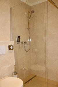 Koupelna v ubytování City Inn 24H Self Check-In by H&H Hotels
