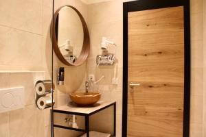 Koupelna v ubytování City Inn 24H Self Check-In by H&H Hotels