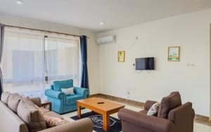 TV a/nebo společenská místnost v ubytování Wembley Villa Diani Beach