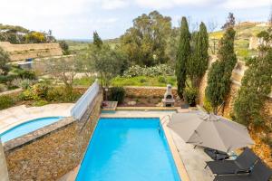 Bazén v ubytování Dionisia Gozitan Villa and Pool Gozo - Happy Rentals nebo v jeho okolí
