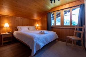 Voodi või voodid majutusasutuse Chalet Diablerets toas