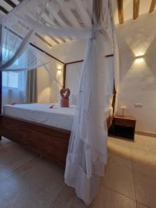 Ένα ή περισσότερα κρεβάτια σε δωμάτιο στο Amini Villa +6 φωτογραφίες