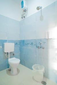 Koupelna v ubytování S S Hotels Bannerghatta