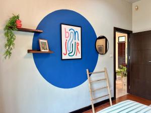 a blue wall in a room with a ladder at MYSA 3bed Pool Villa Near Central Phuket Bang Tao in Phuket +41 photos