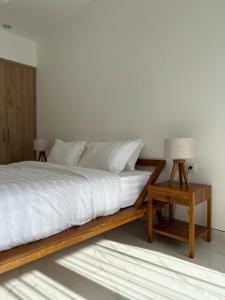 Ένα ή περισσότερα κρεβάτια σε δωμάτιο στο NEW SANUR Villa 4 Bedrooms or 6 Bedrooms