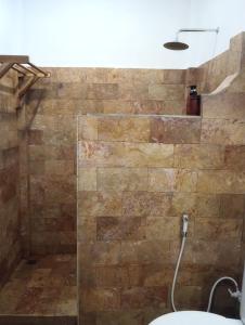 Koupelna v ubytování Dili gili